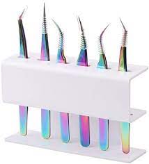 a set of rainbow tweezers held in a specialty case.
