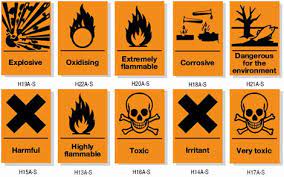 a display of various orange safety labels 