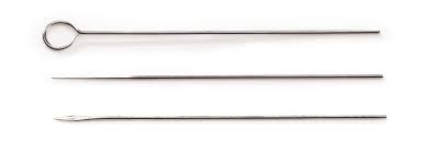 a set of three needles with small differences in shape