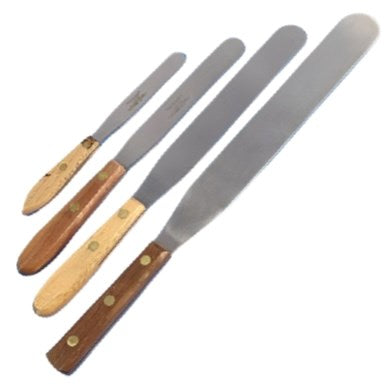 Large stainless steel spatulas, wooden handles