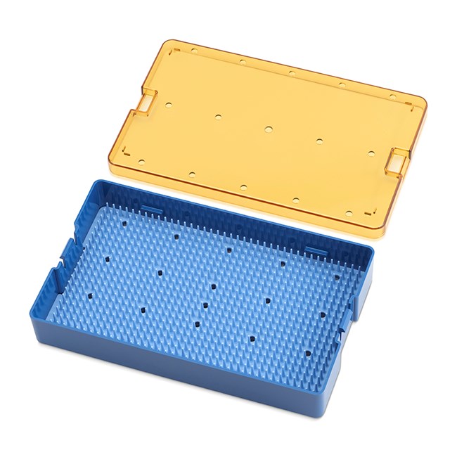 Sterilisation trays with silicone mat and lid