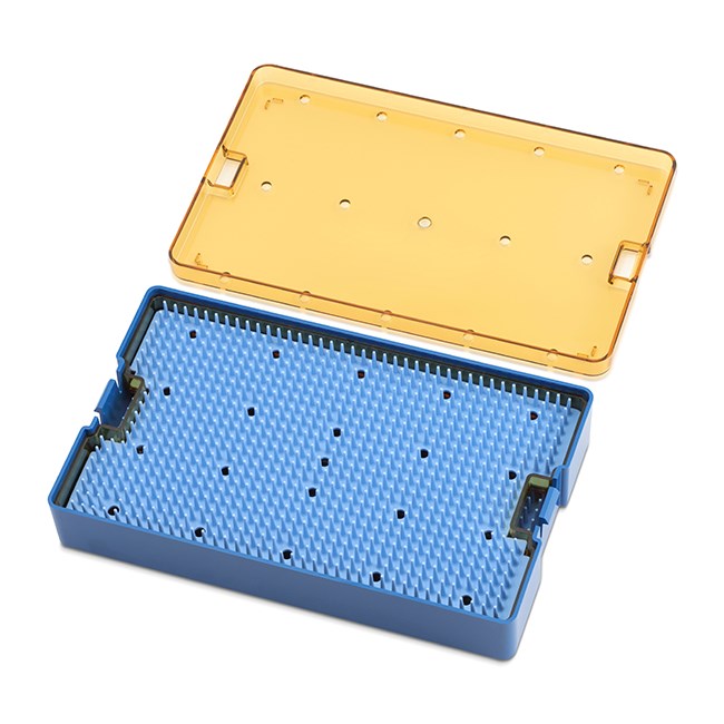 Sterilisation trays with silicone mat and lid