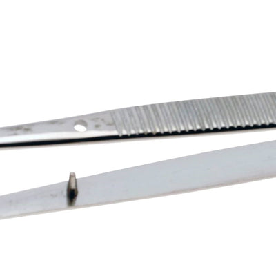 Forceps with serrated grips and tips, alignment pin